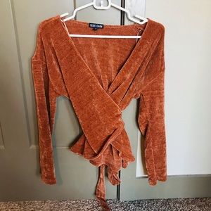 Secret charm brand tied sweater